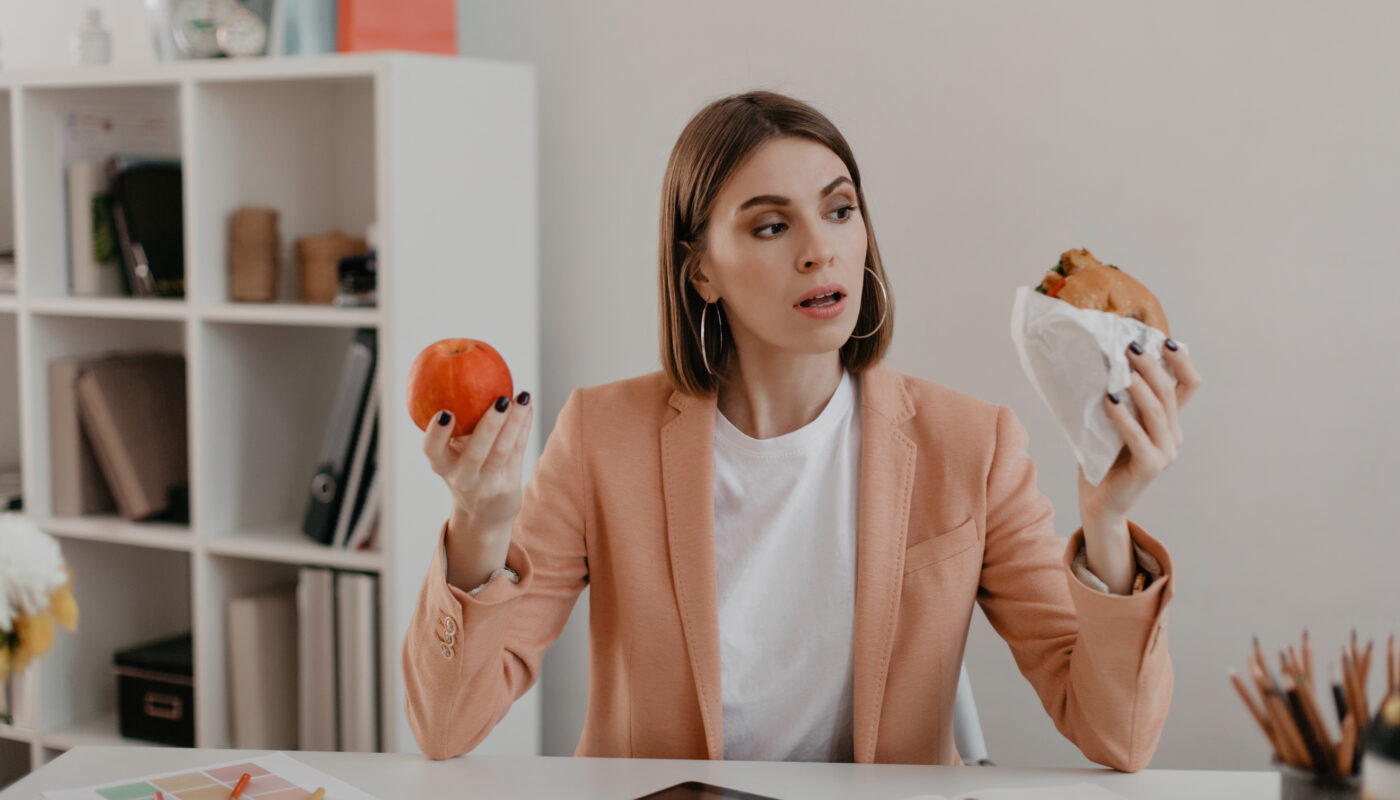 https://www.freepik.com/free-photo/picture-business-woman-pink-jacket-sitting-workplace-woman-choose-tasty-burger-wholesome-apple_11932617.htm#fromView=search&page=2&position=0&uuid=a9be6450-071c-4657-92ce-c01570a19668&query=What+Should+I+Eat+Before+and+After+Exercise+to+Prevent+Cramps%3F