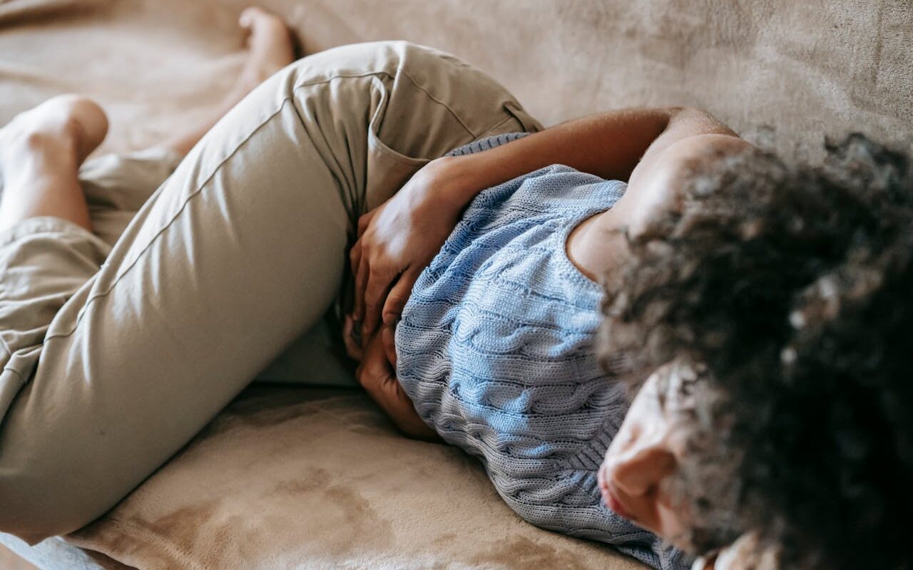 Image source: https://www.pexels.com/photo/woman-suffering-from-a-stomach-pain-5938362/